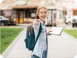 girl with backpack and book image